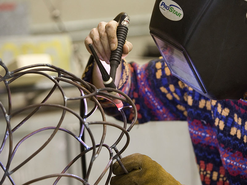 A student working on a sculpture.