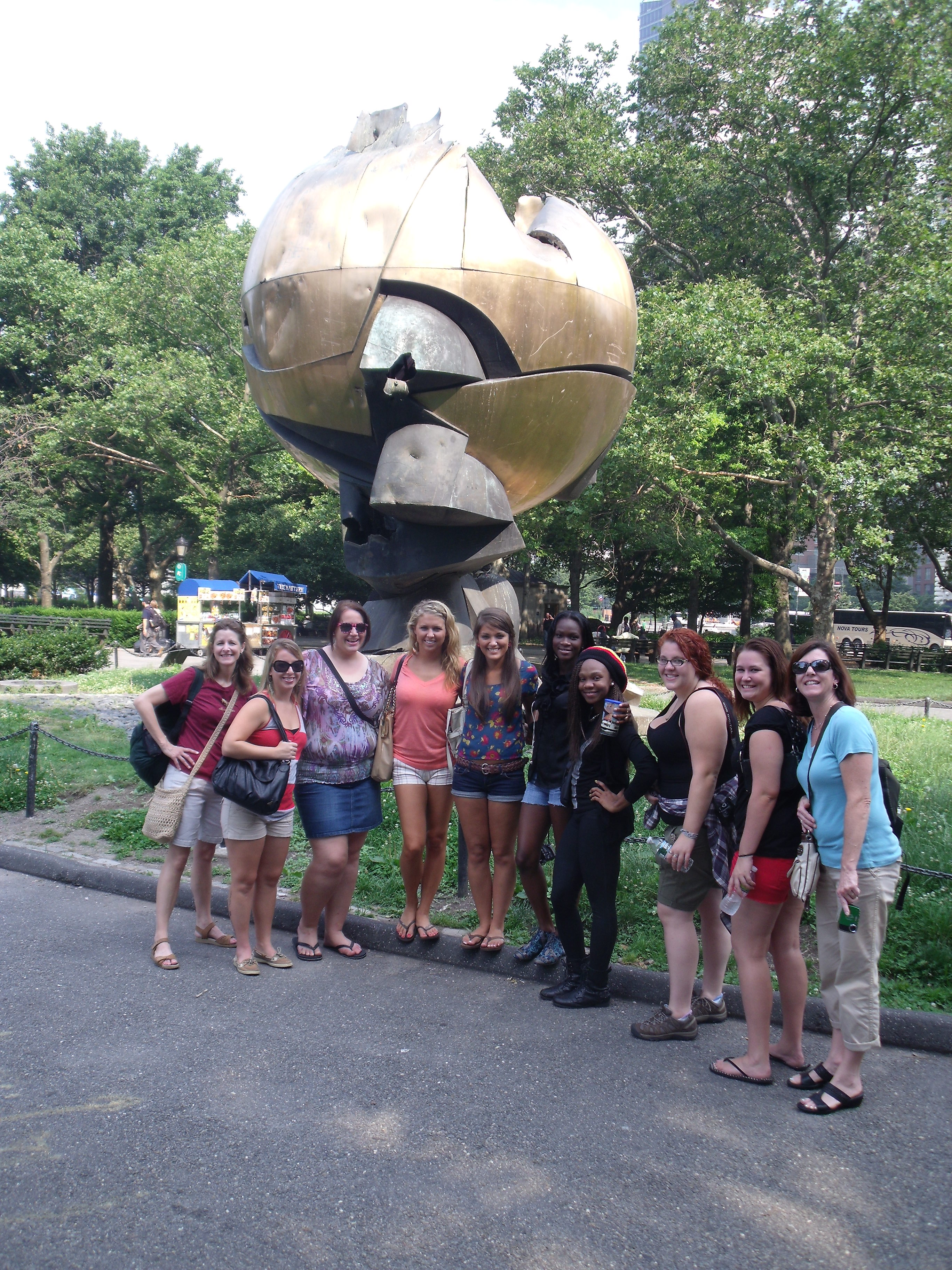 A group shot in front of the 9/11 sculpture.