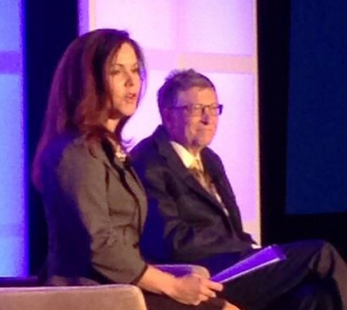 Dr. Annmarie Willette and Bill Gates on stage at event