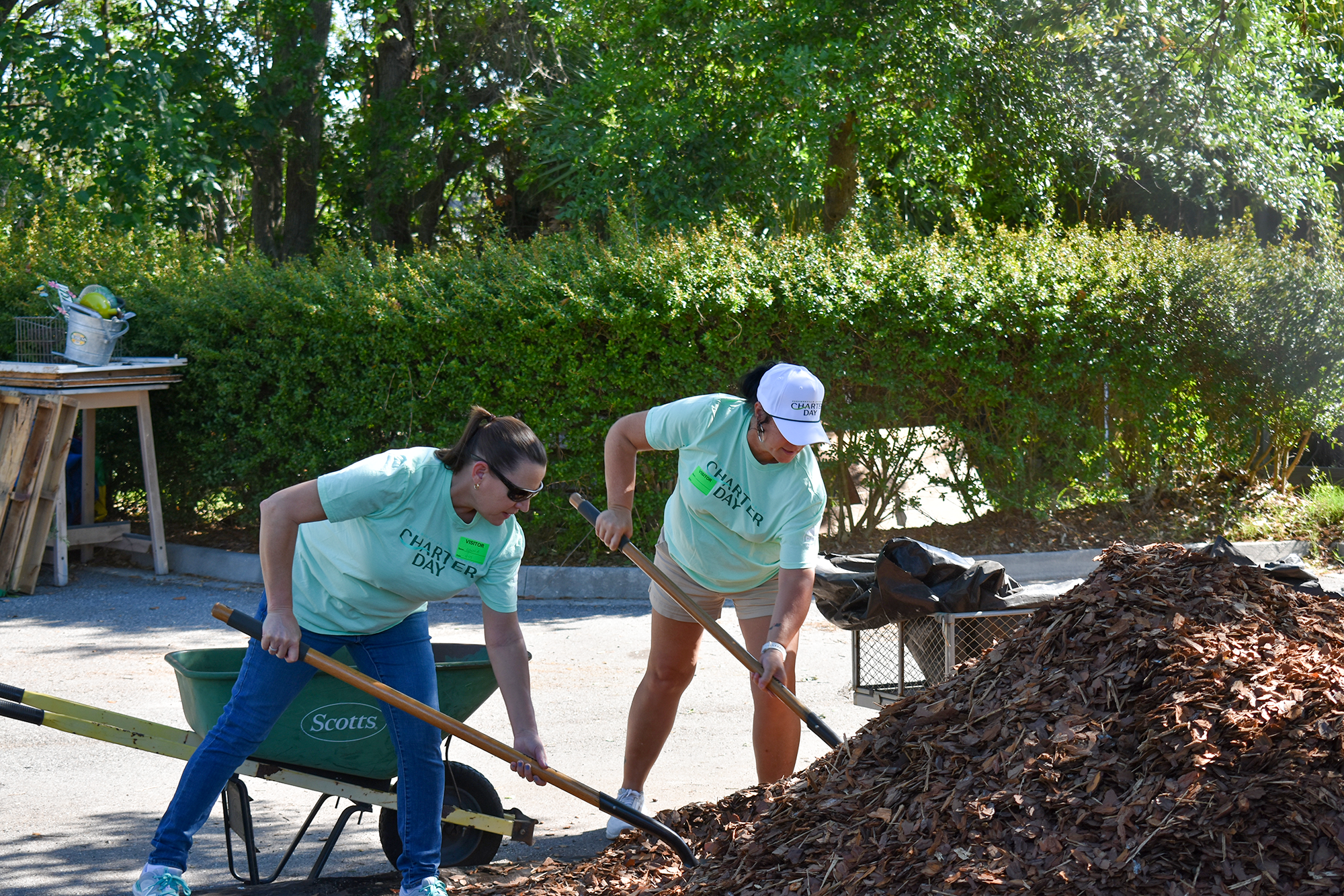 Volunteers shoveling merch for a nonprofit organization.