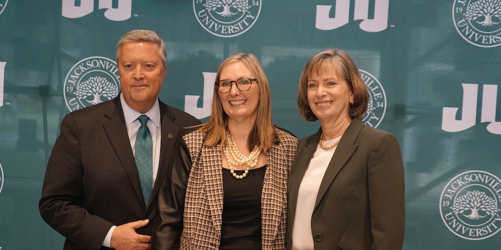 Group photo of Tim and Stephanie Cost with Lisa Sutherland