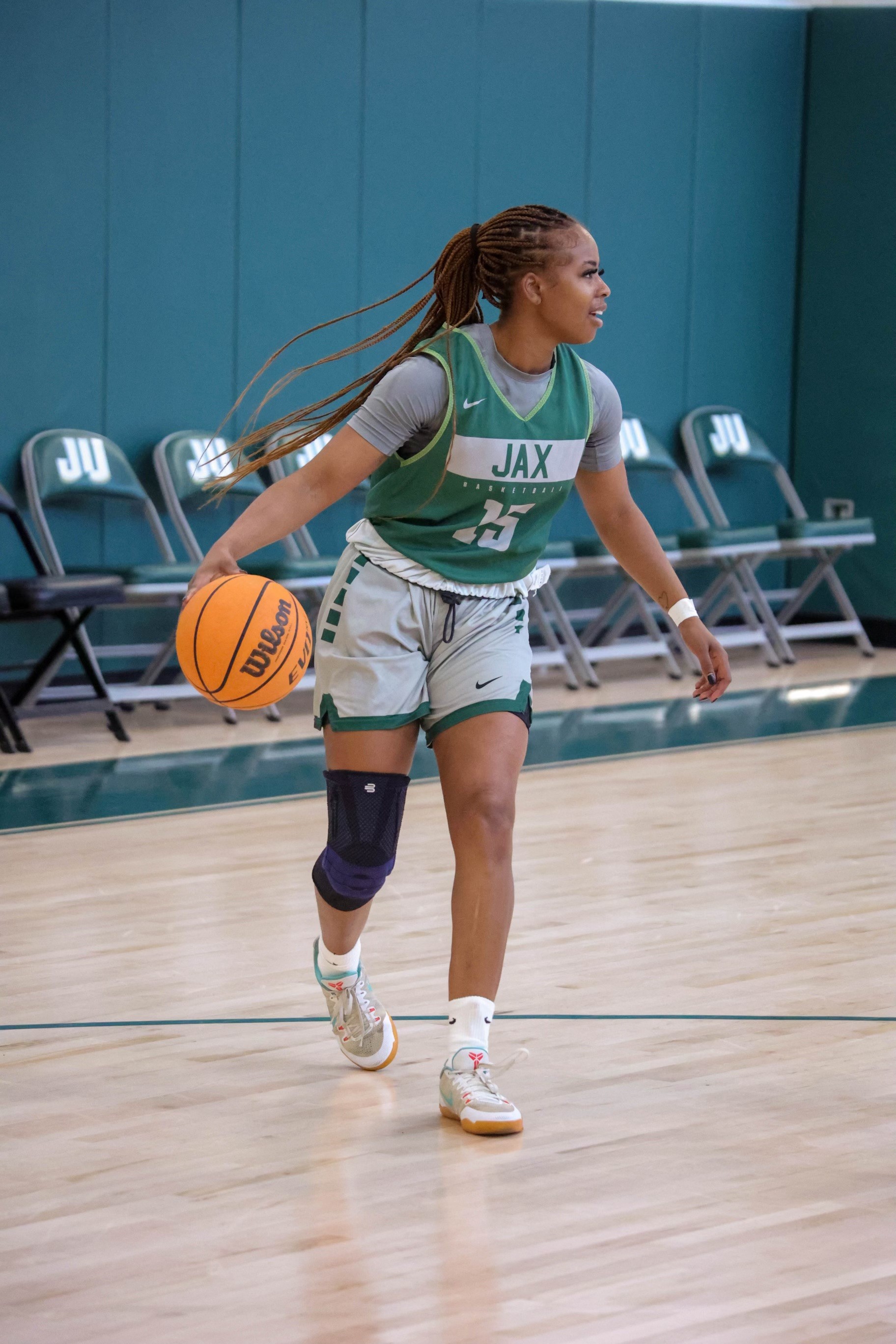 Emmy playing basketball