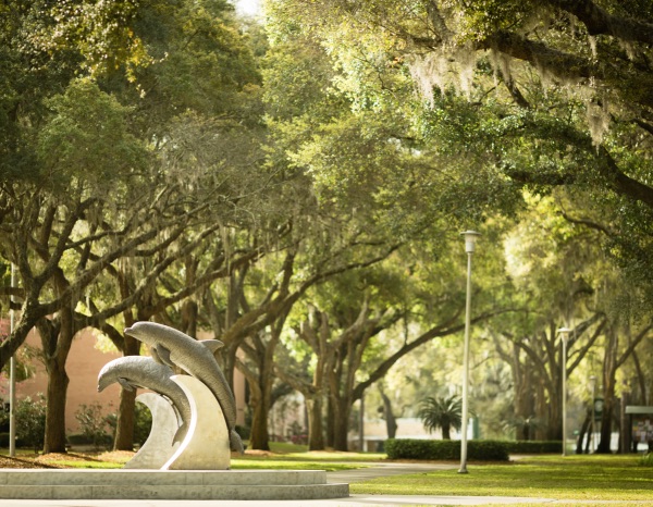 The dolphin statues behind Howard Administration Building.