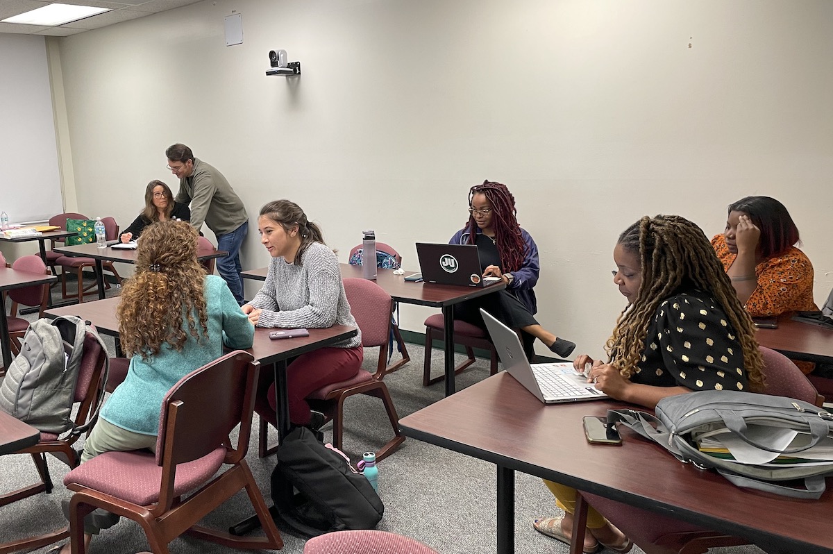Students in a classroom working on individual projects