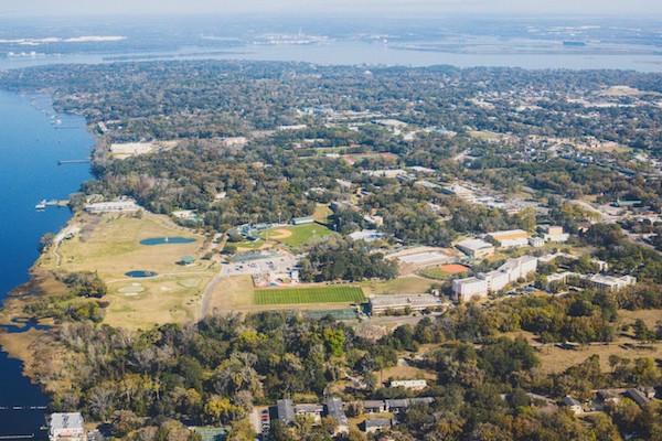 An arial view of the JU Jacksonville Campus, with the St. John's River seen on the left.