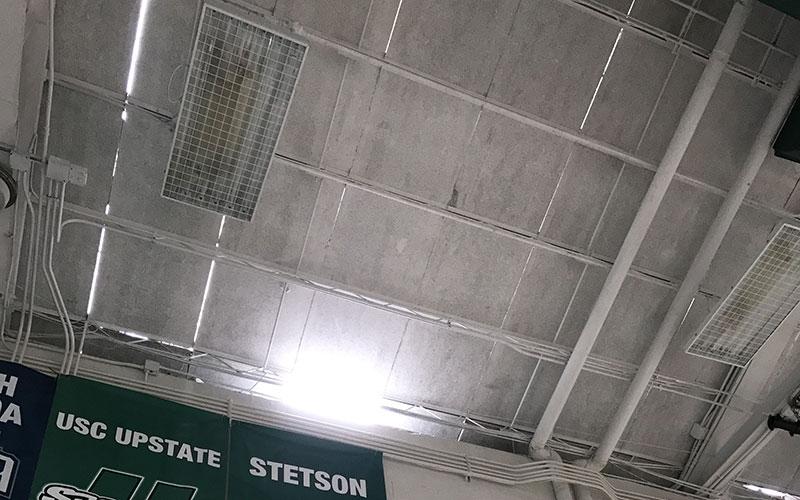 Sunlight pouring through the roof of Historic Swisher Gymnasium