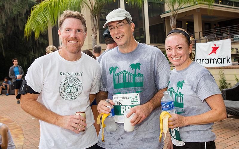 Runners celebrating at the River House