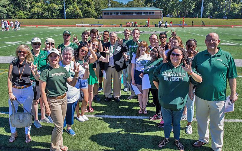 Fine Arts Alumni sung the Alma Mater before the Homecoming game