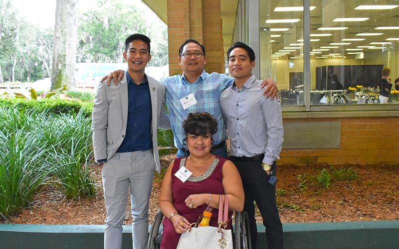 Green Key student with his family