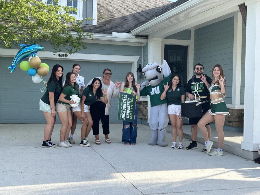 Nursing freshman students with JU's mascot Dunk'n the Dolphin