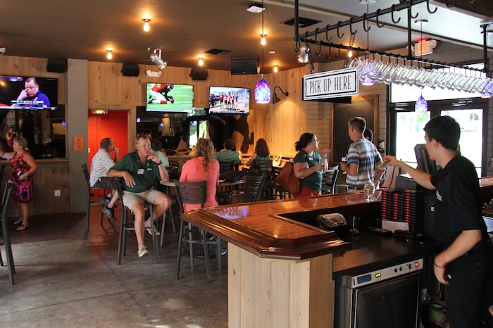 A group of people at River House, Jacksonville University.