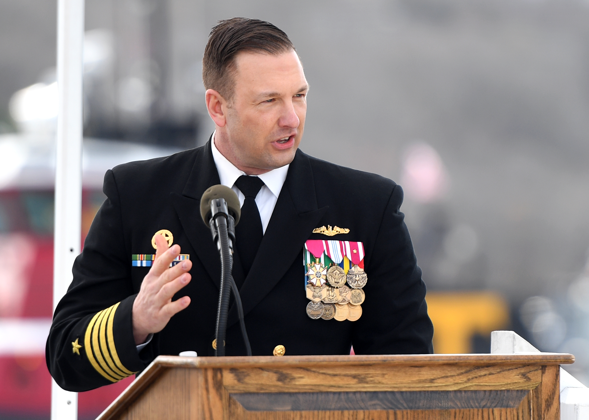 Capt. Phil Castellano at podium
