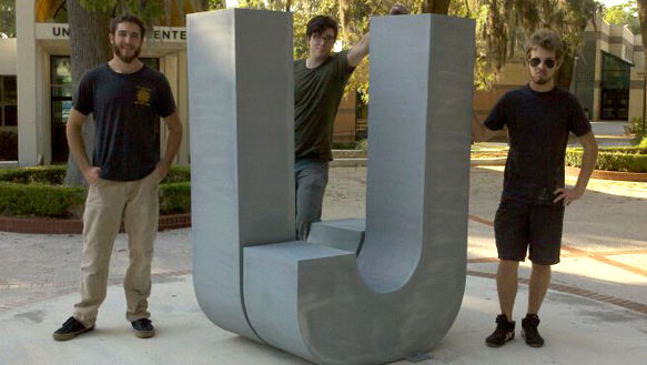 Students at the Ju Logo