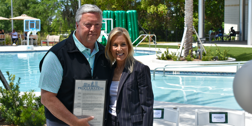 Mayor Donna Deegan and President Tim Cost with the Charter Day proclamation