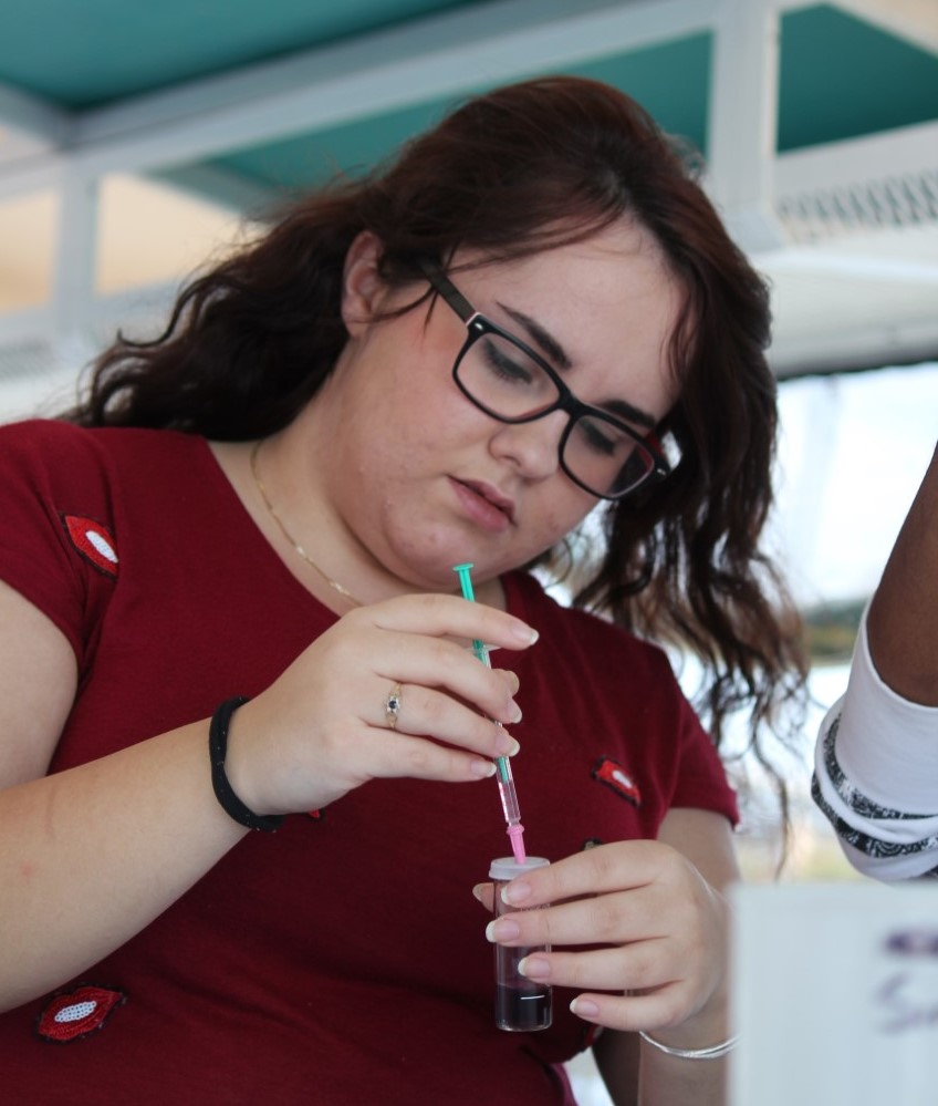 Student working on a test tube