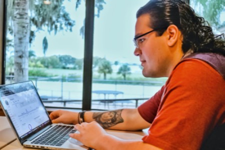 Student analyzes social media data.