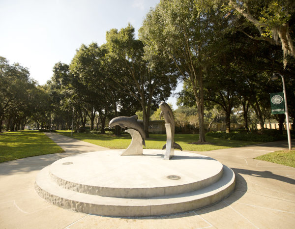 Jacksonville University Dolphin statutes behind Howard building.