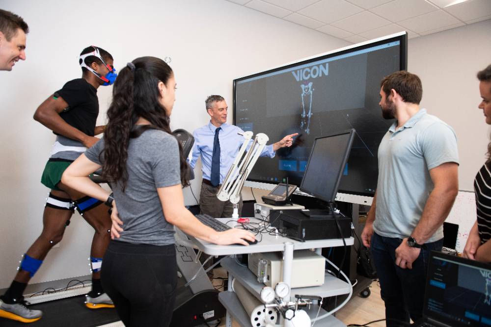 JU Student performing a physical on a treadmill.