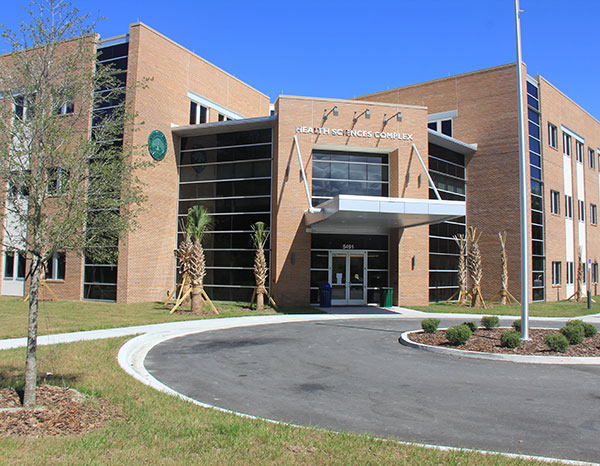 The exterior of the main entrance to the Health Sciences Complex where the Student Health Center is located.