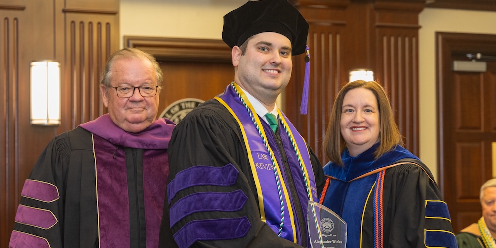 Alex Wicks at the College of Law graduation