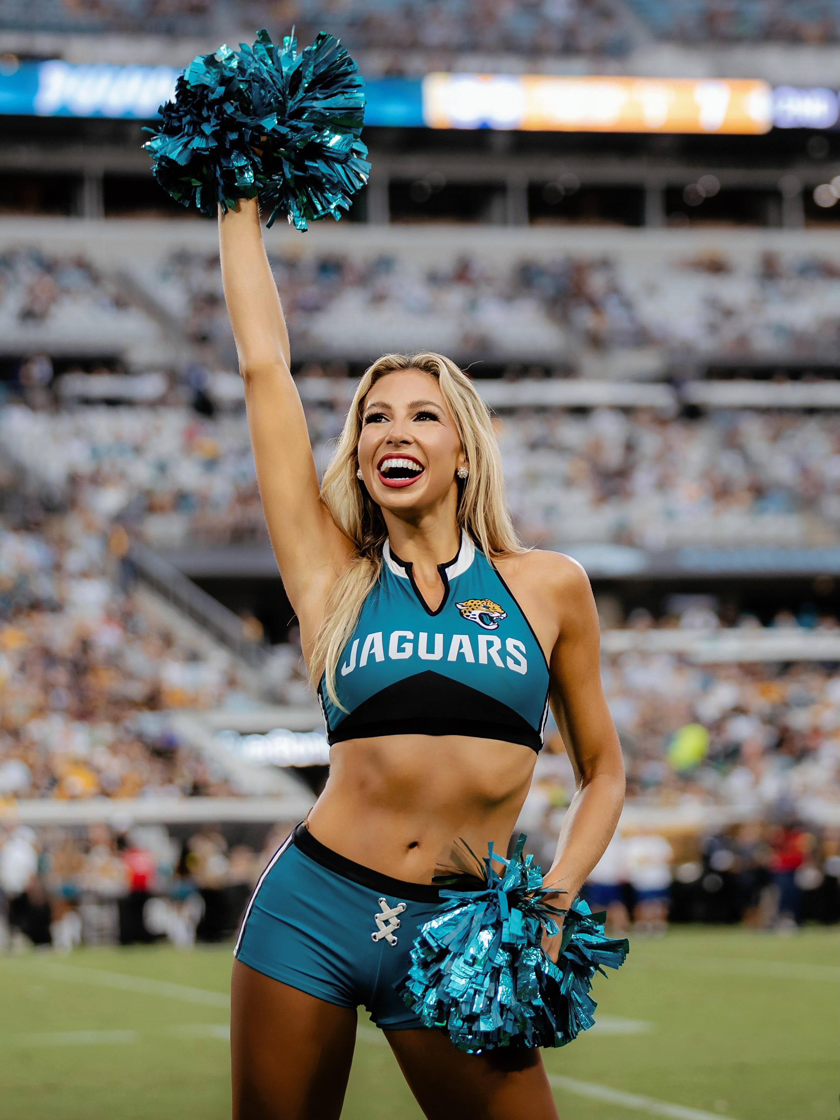 Anjelica Jones cheering in Jags uniform