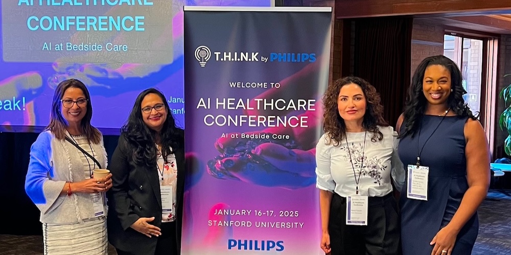 Dr. Gainer with colleagues at T.H.I.N.K AI Healthcare Conference
