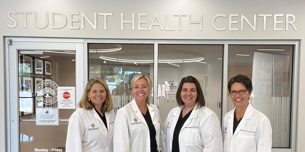 Nurses in front of Student Health Center