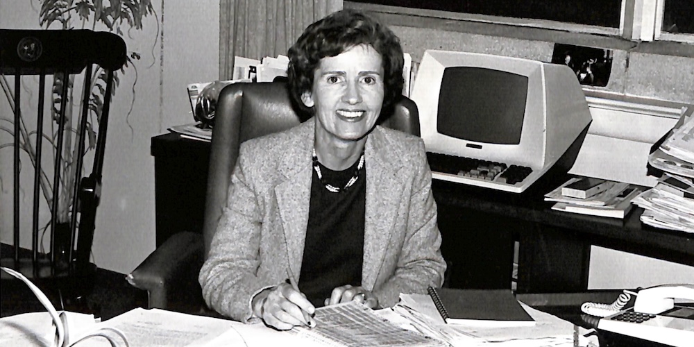 Joan Carver at her desk