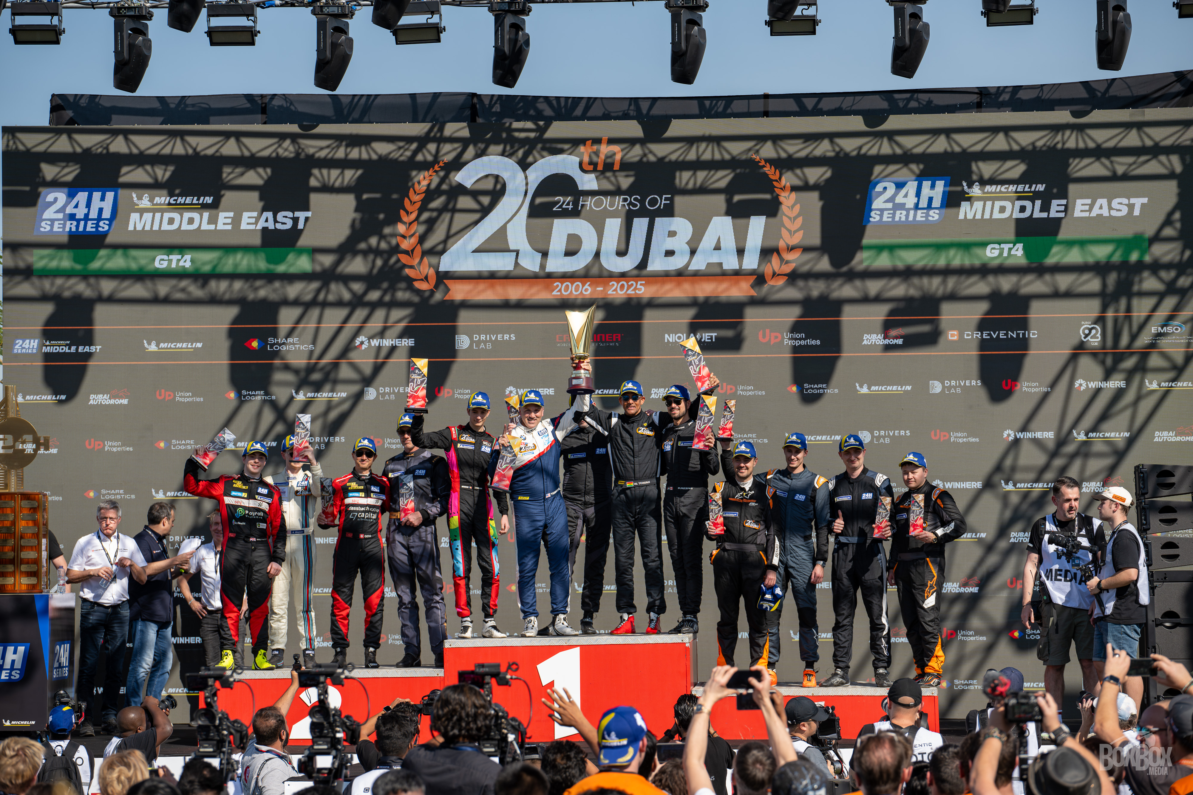 Tiger Tari on race podium with team in Dubai