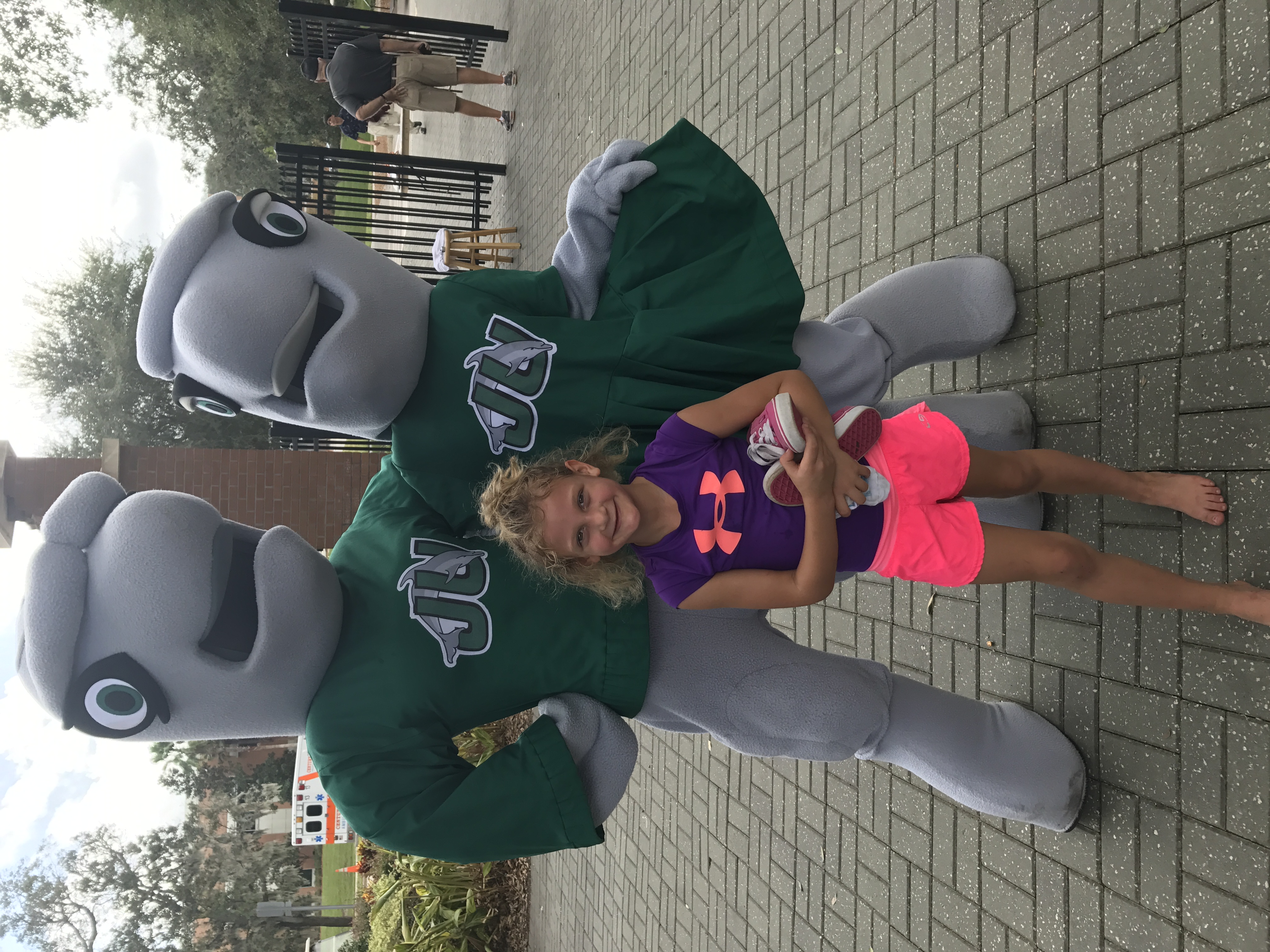 Young Abby standing with JU mascot