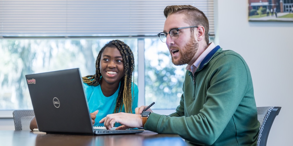 Students working on laptop