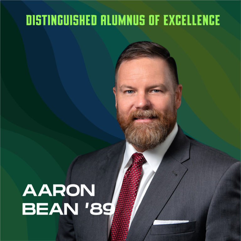 Aaron Bean headshot with text "Distinguished Alumni of Excellence, Aaron Bean '89"