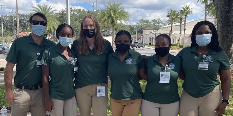 JU Nursing students helping at Bolles High School.