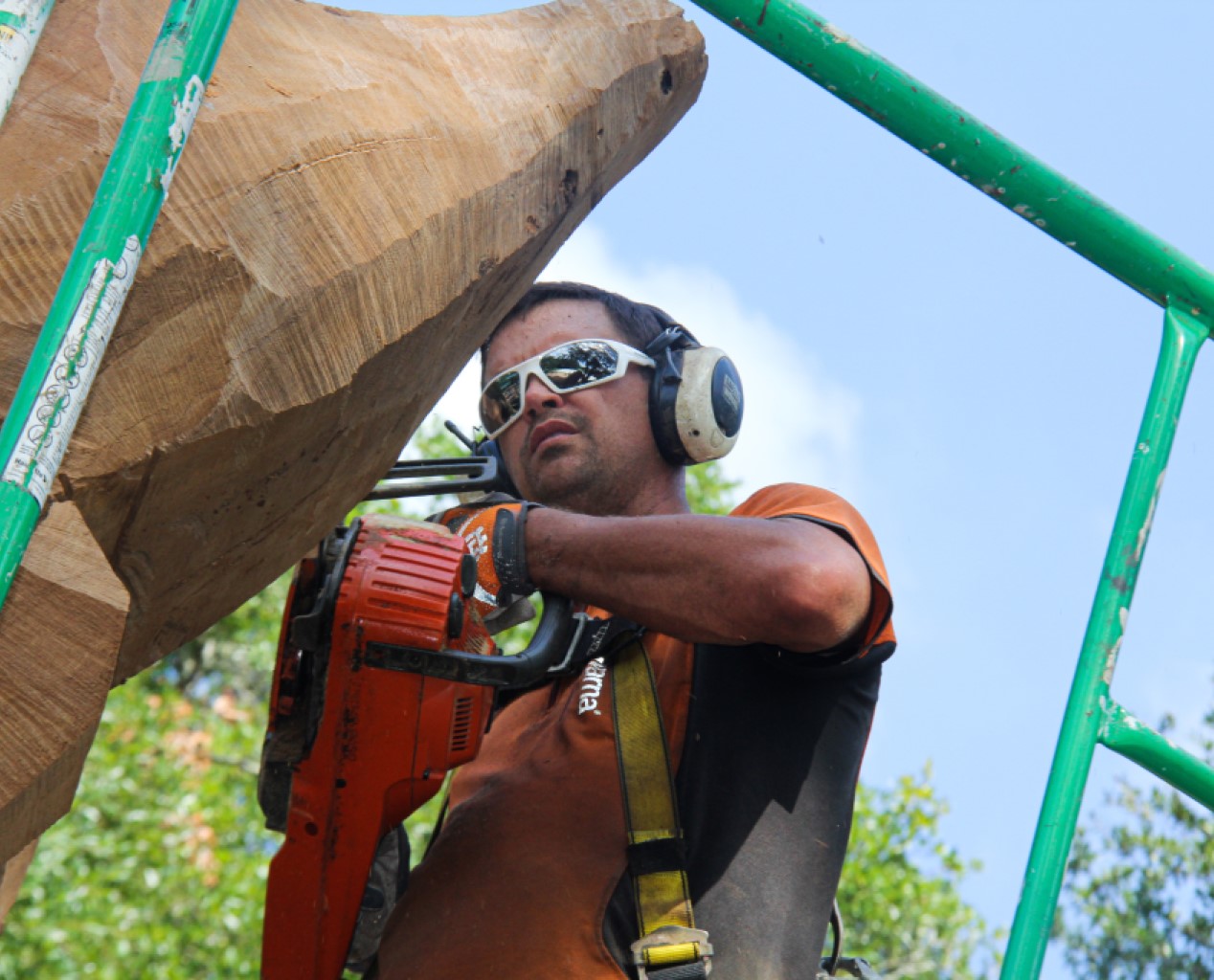 man sawing wood
