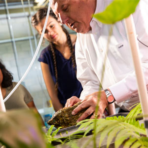 Dr. Quint White works with students during a hands-on lesson at the JU Marine Science Research Institute.