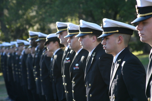 JU NROTC students standing in a line, in uniform.