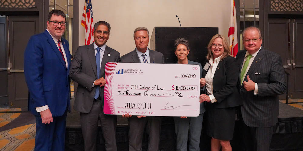 JBA presents check to the College of Law