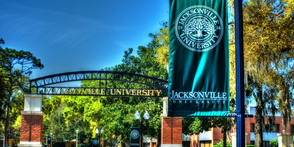 A photo of the entrance and front gates of JU. 