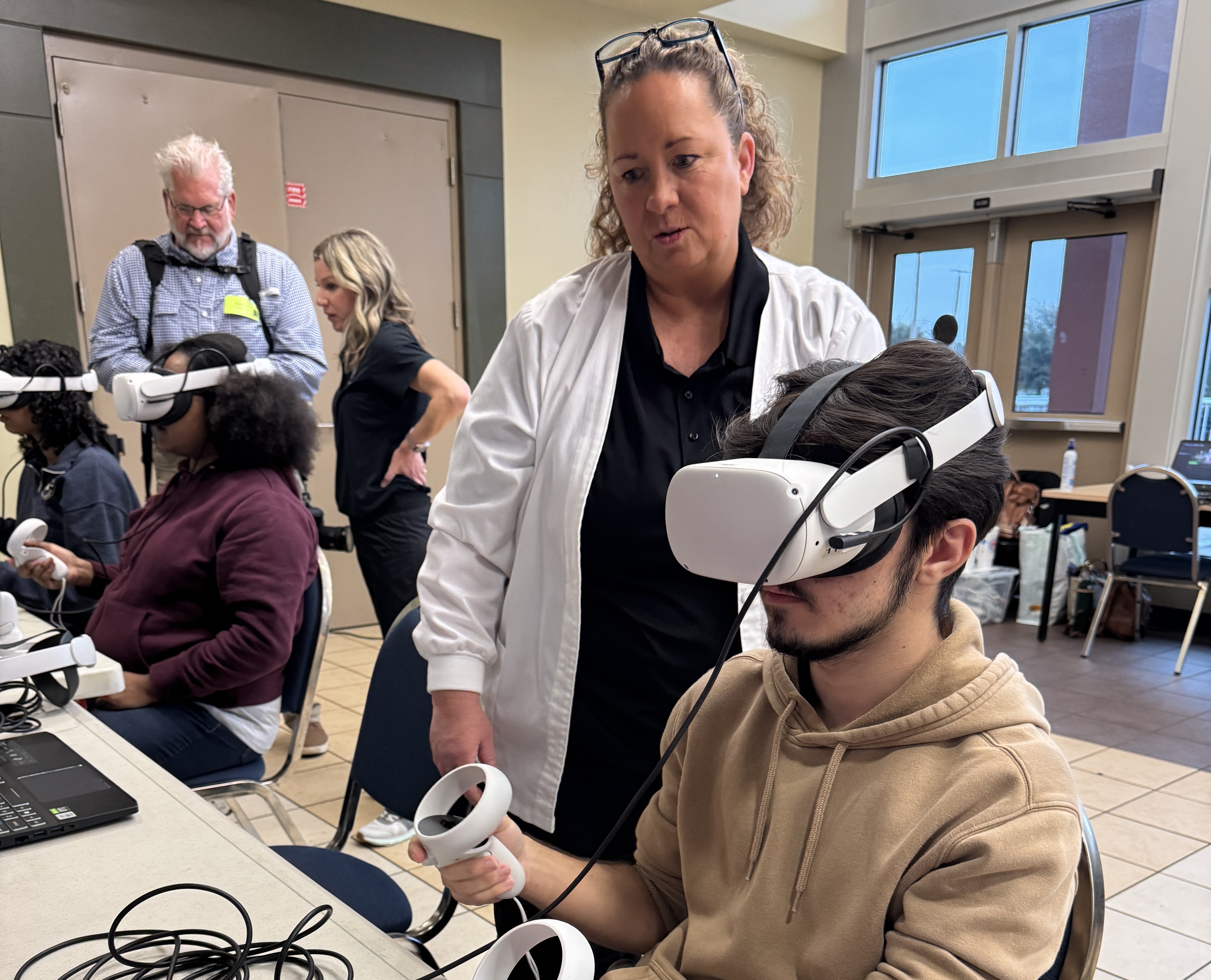 JU nurse with ACHS student