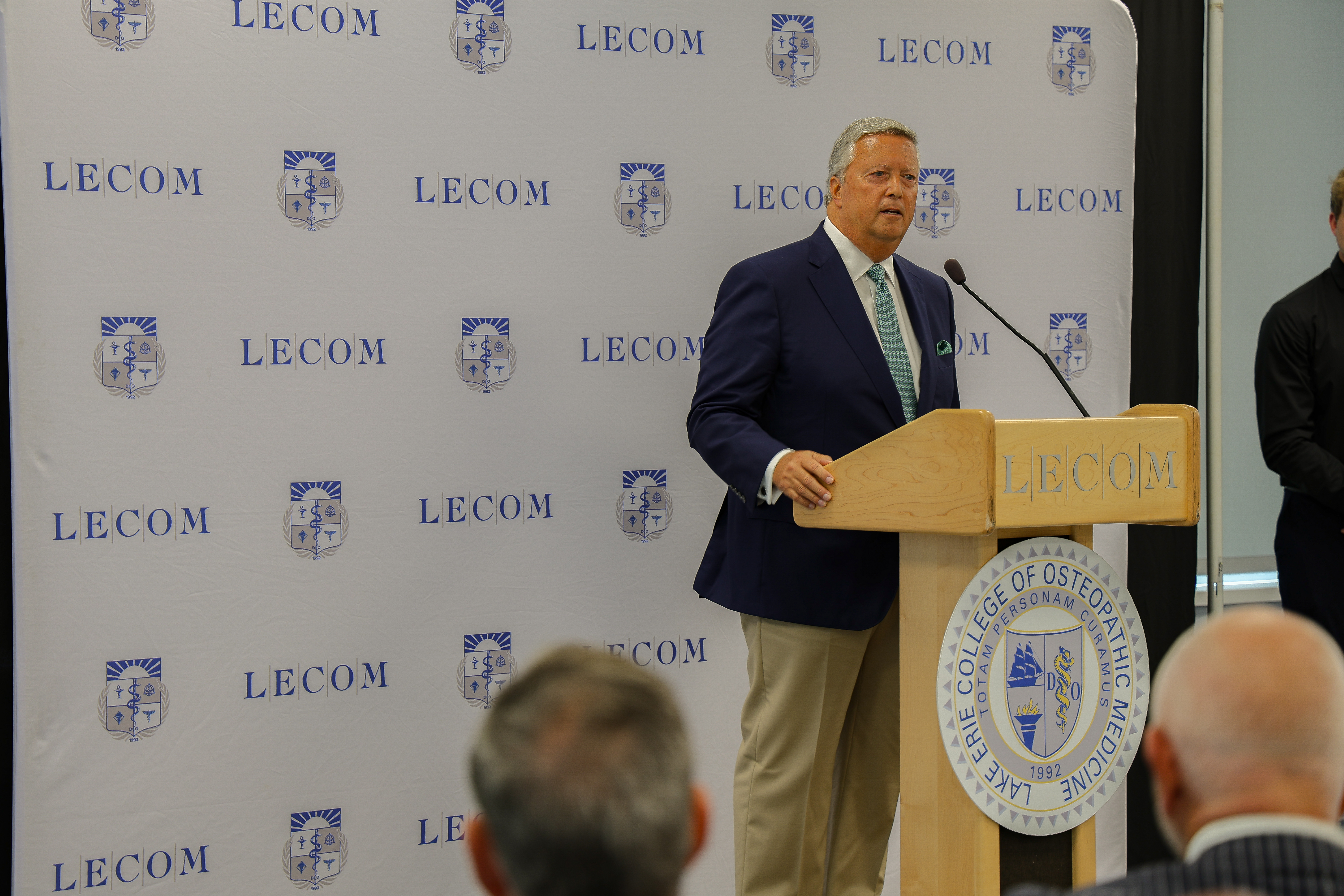 Tim Cost speaking at LECOM ribbon cutting ceremony