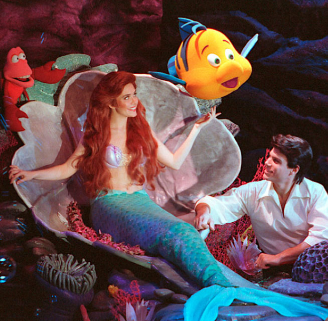 Leanza Cornett acting as Ariel the Mermaid from the Little Mermaid with a male actor playing Prince Eric