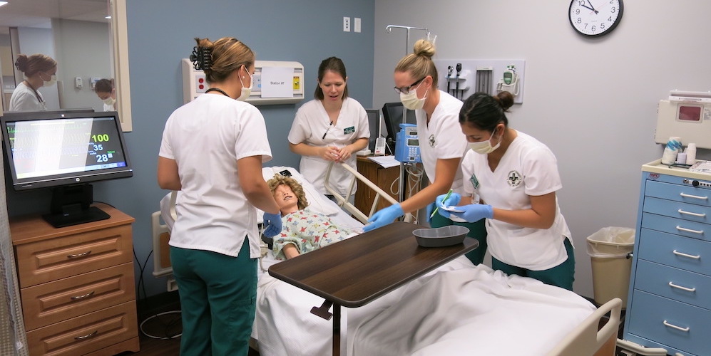 Nursing students work in star lab