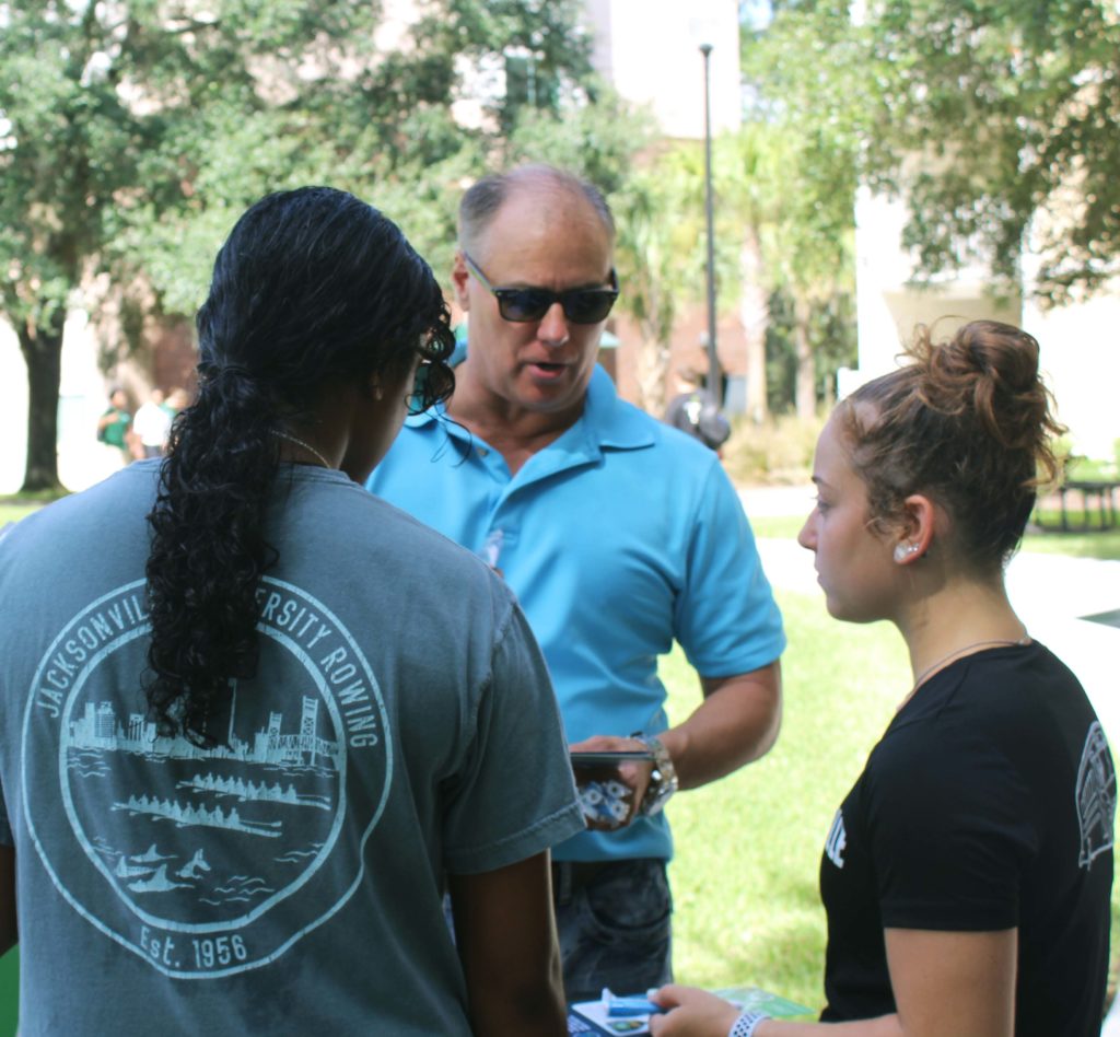 ProtechDNA President Shawn Andreas explains to JU students how the technology works.