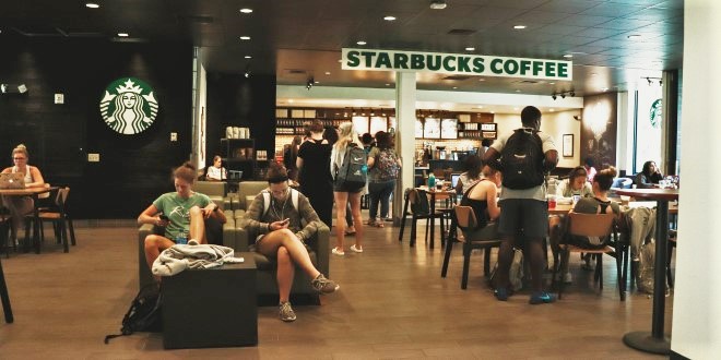 Students sit and study at JU Starbucks