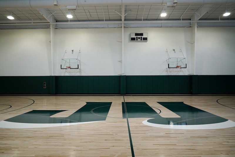 JU logo on basketball court