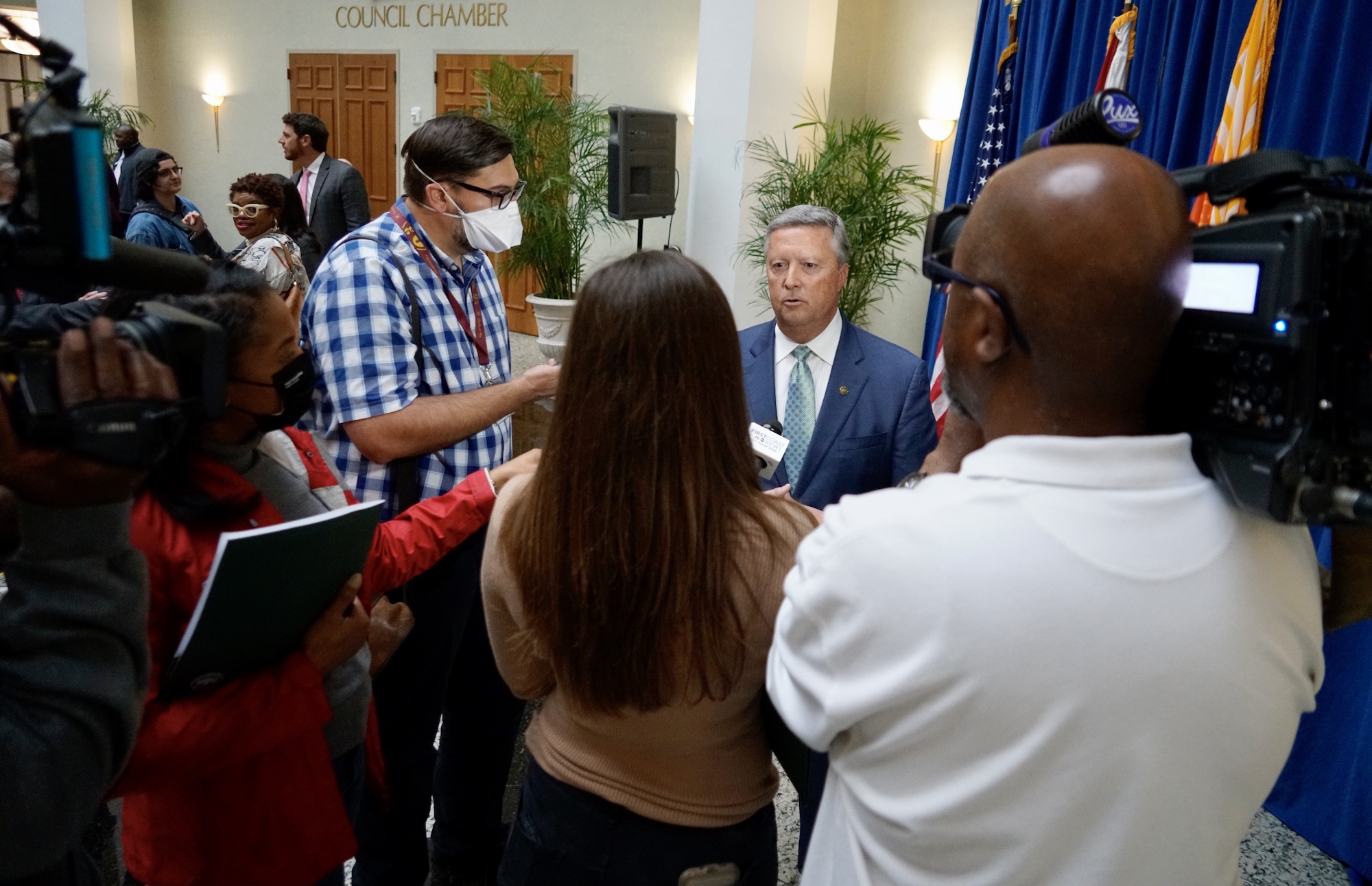 press conference with people discussing the law school