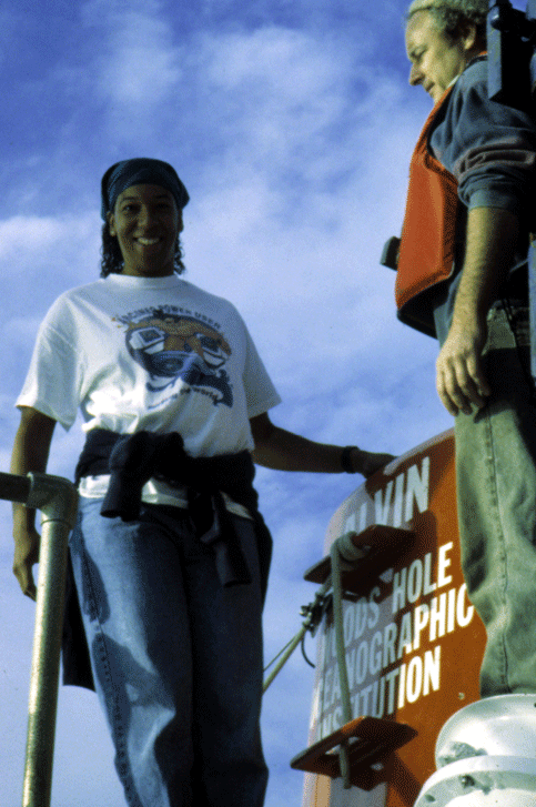 Dawn Wright smiling while standing on a boat.