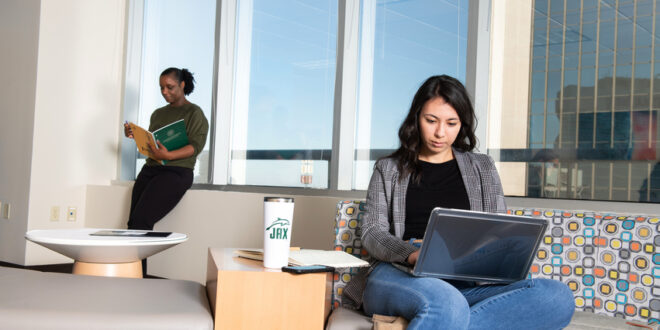 students study in downtown campus common area