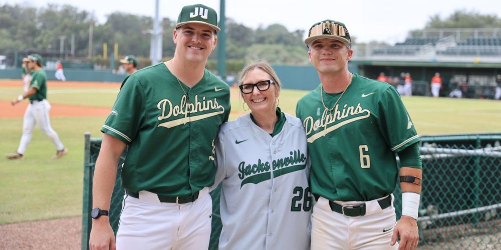 Dr. Sutherland with members of the JU Baseball team
