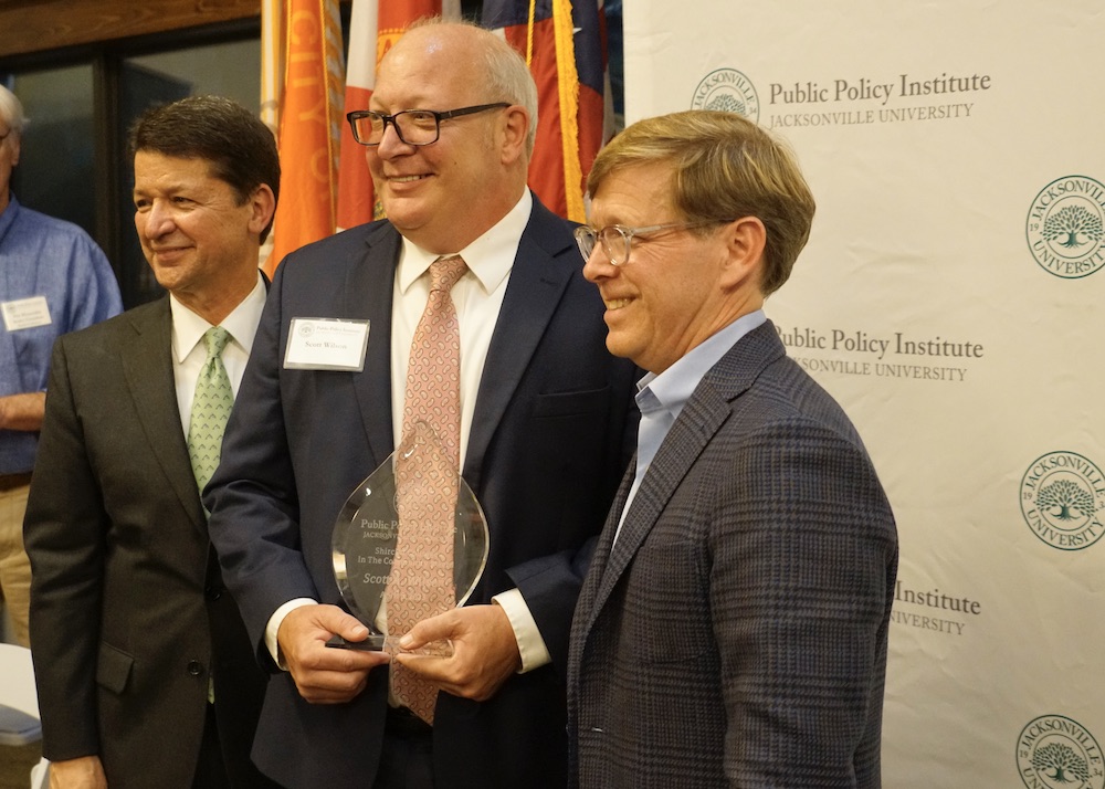 scott wilson with award, rick mullaney and john peyton